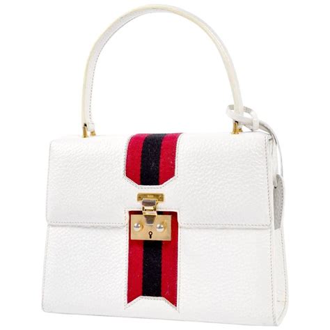 03013c2e91k409 gucci|white gucci handbag.